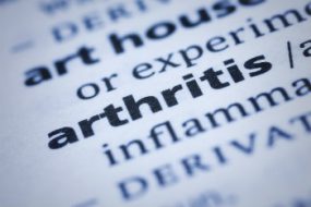 close-up image of arthritis definition from dictionary.